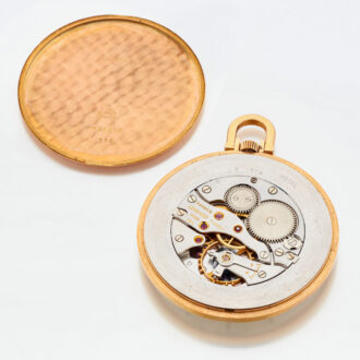 Fine Swiss 18 carat gold thin open faced watch Circa 1960