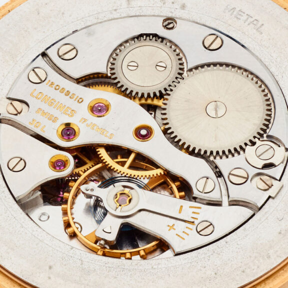 Fine Swiss 18 carat gold thin open faced watch Circa 1960 Fine Swiss 18 carat gold thin open faced watch Circa 1960