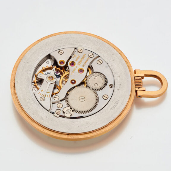 Fine Swiss 18 carat gold thin open faced watch Circa 1960 Fine Swiss 18 carat gold thin open faced watch Circa 1960