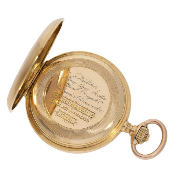 This watch, made of 18 Carat gold, has a half hunting case with a signed dust cover This watch, made of 18 Carat gold, has a half hunting case with a signed dust cover