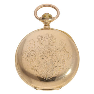 This watch, made of 18 Carat gold, has a half hunting case with an elaborate noble coat of arms on the back