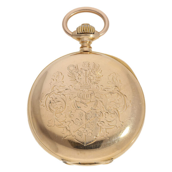 This watch, made of 18 Carat gold, has a half hunting case with an elaborate noble coat of arms on the back This watch, made of 18 Carat gold, has a half hunting case with an elaborate noble coat of arms on the back