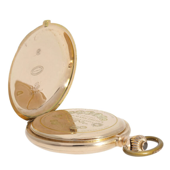 The medal table and identification as the court watchmaker of the Russian Tsar's House further add to its historical significance The medal table and identification as the court watchmaker of the Russian Tsar's House further add to its historical significance