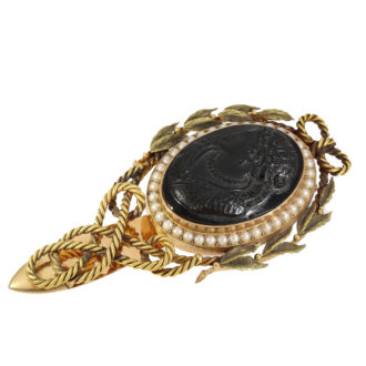 Chatelaine with high quality and extremely finely cut hardstone cameos (probably layered agate), red brown base, raised black cameo and surrounded by oriental pearls