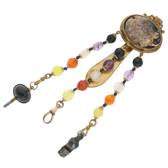 The associated gilded chatelaine is also adorned with stone trimmings, including an upper part with very attractive agate inlay The associated gilded chatelaine is also adorned with stone trimmings, including an upper part with very attractive agate inlay