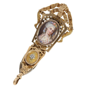 The chatelaine's upper part features an oval enamel plaque depicting a lady in the finest magnifying glass painting