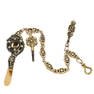 The associated gold enamel snake shaped chatelaine weighs approximately 12 grams and is approximately 15 cm long The associated gold enamel snake shaped chatelaine weighs approximately 12 grams and is approximately 15 cm long