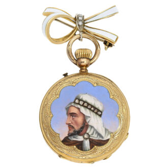 To complement this exquisite pocket watch, there is a matching gold and enamel brooch, also adorned with diamonds