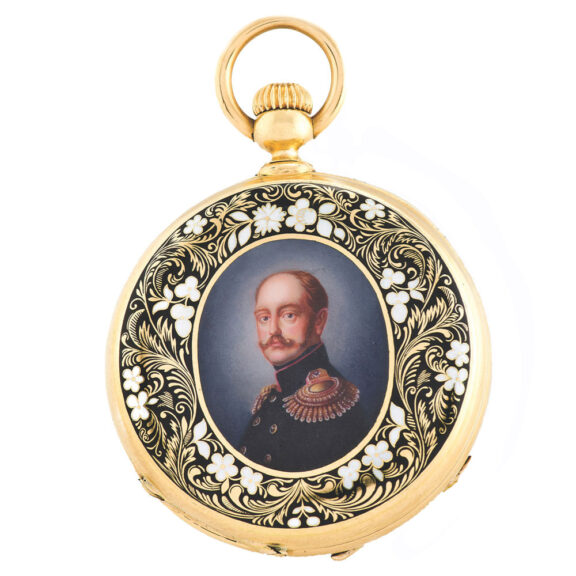 The back is covered with a finely enamelled oval portrait of the Russian Tsar Alexander II The back is covered with a finely enamelled oval portrait of the Russian Tsar Alexander II