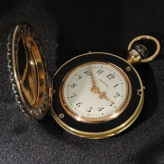 Swiss 18 carat gold and enamel with diamonds Circa 1925