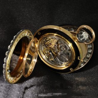 Swiss 18 carat gold and enamel with diamonds Circa 1925