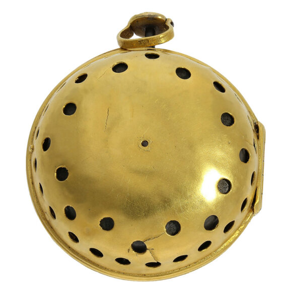 This timepiece boasts a silver open faced case with sound openings that were later gilded This timepiece boasts a silver open faced case with sound openings that were later gilded