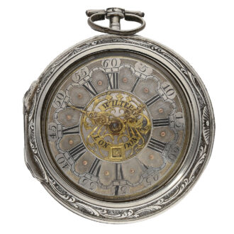 The original champlevé dial of the watch boasts a date window and original hands