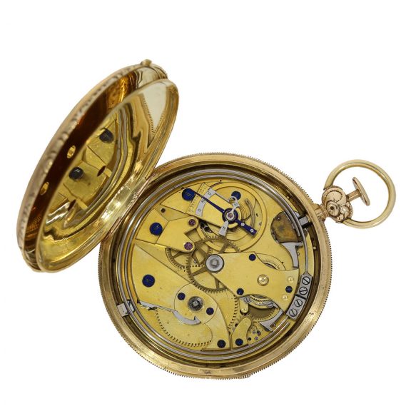 French 18 carat gold and enamel watch with erotic scene Circa 1830 French 18 carat gold and enamel watch with erotic scene Circa 1830