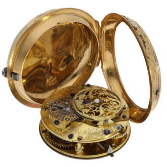 The movement of this clock features a verge escapement and a particularly large balance wheel, ensuring that the clock keeps time accurately and reliably