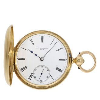 The original glazed white enamel dial has an outer ring with Roman numerals for the hours, a subsidiary dial at 6 o’clock with Arabic numerals for the minutes and original steel hands