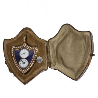 Swiss gold enamel form watch in shield shape in original box Circa 1800 Swiss gold enamel form watch in shield shape in original box Circa 1800