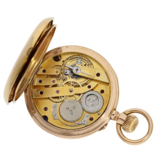The movement features a Geneva anchor chronometer escapement with a particularly large balance wheel and wolf's teeth
