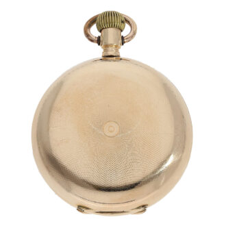 The watch is housed in a 14 carat gold case that has been glazed, engine turned and engraved