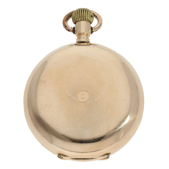 The watch is housed in a 14 carat gold case that has been glazed, engine turned and engraved The watch is housed in a 14 carat gold case that has been glazed, engine turned and engraved