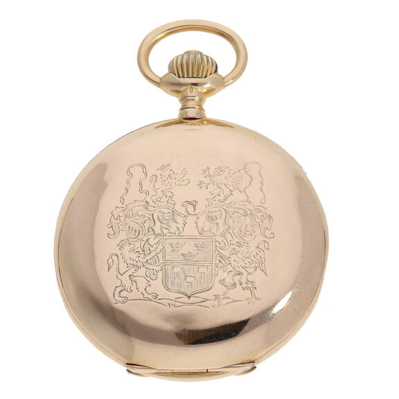 The 18 Carat pink gold full hunter case of the watch has a spring cover engraved with the Swedish royal coat of arms The 18 Carat pink gold full hunter case of the watch has a spring cover engraved with the Swedish royal coat of arms