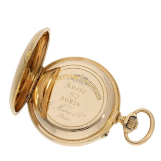 The dust cover of this pocket watch is also engraved and signed