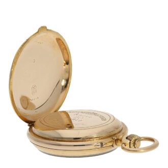 The dust cover of this pocket watch is also engraved and signed