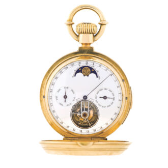 Calendar dial: white enamel with aperture for the tourbillon with regulation scale on the edge, outer date ring, subsidiary dials for the days of the weeks and the months, aperture for the moon phases with moon’s age indication on the circumference and blued steel calendar hands.