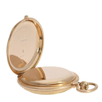 Fashioned from 14 Carat gold, this heavy pocket watch has a full hunter case