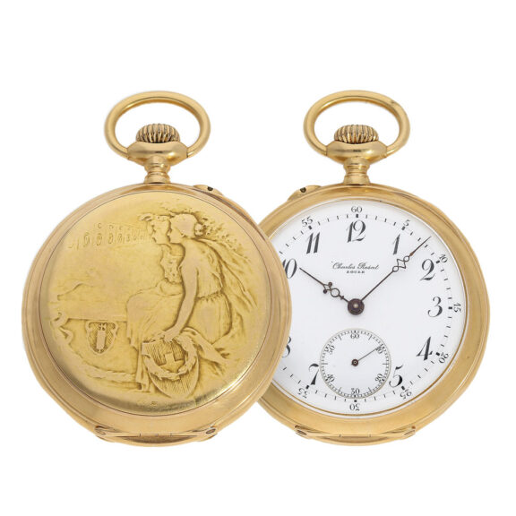 The watch features an open faced case made of 18 Carat gold which has an Art Nouveau relief on the back and a dust cover, which bears the inscription "Eidgenössisches Schützenfest St. Gallen 1904" (Federal Shooting Festival St. Gallen 1904) The watch features an open faced case made of 18 Carat gold which has an Art Nouveau relief on the back and a dust cover, which bears the inscription "Eidgenössisches Schützenfest St. Gallen 1904" (Federal Shooting Festival St. Gallen 1904)