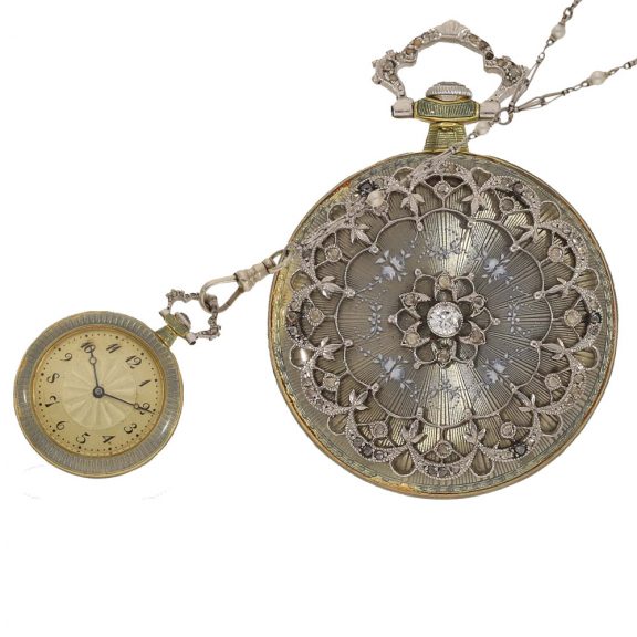 Swiss 18 carat gold and enamel watch decorated with pearls Circa 1900 Swiss 18 carat gold and enamel watch decorated with pearls Circa 1900