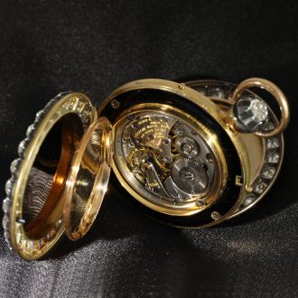 Swiss French 18 carat gold and enamel watch with diamonds Circa 1925