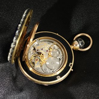 Swiss French 18 carat gold and enamel watch with diamonds Circa 1925