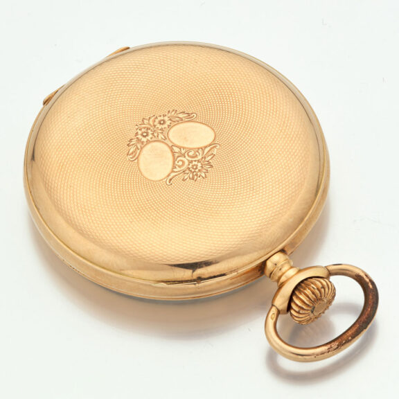 Swiss lever watch in a 14k gold open faced case Circa 1910 Swiss lever watch in a 14k gold open faced case Circa 1910