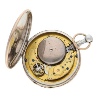 The escapement and the entire gear train are located under two crescent shaped bridges, a feature that is seldom seen in watches of this era