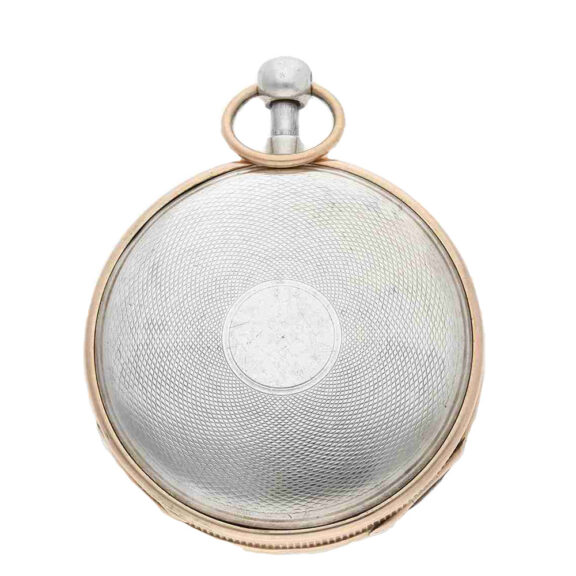 The open faced case of this lépine is crafted in the style of Breguet, featuring silver and red gold with an engine turned design and a coin edge The open faced case of this lépine is crafted in the style of Breguet, featuring silver and red gold with an engine turned design and a coin edge