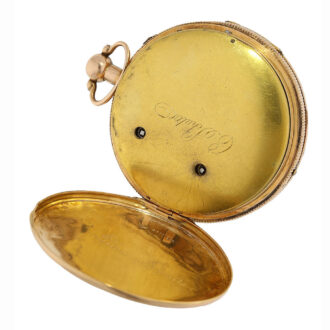 The watch is accompanied by a dust cover that is signed by the maker