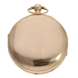 The watch’s plain open faced case is crafted from 18 Carat red gold and has a coin edge