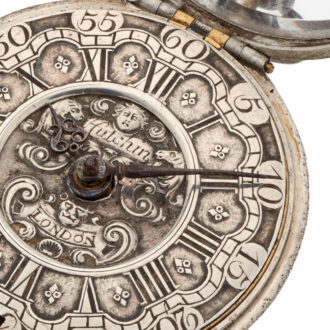 Fine English silver watch with protective outer case Circa 1740