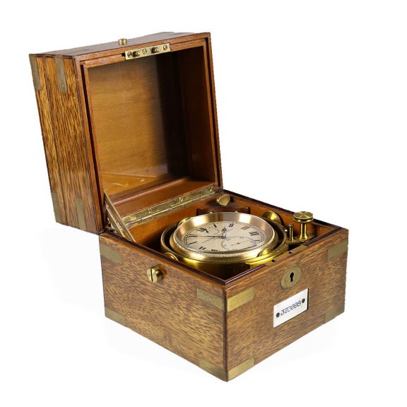 Swiss brass small two day chronometer in mahogany box Circa 1915 Swiss brass small two day chronometer in mahogany box Circa 1915