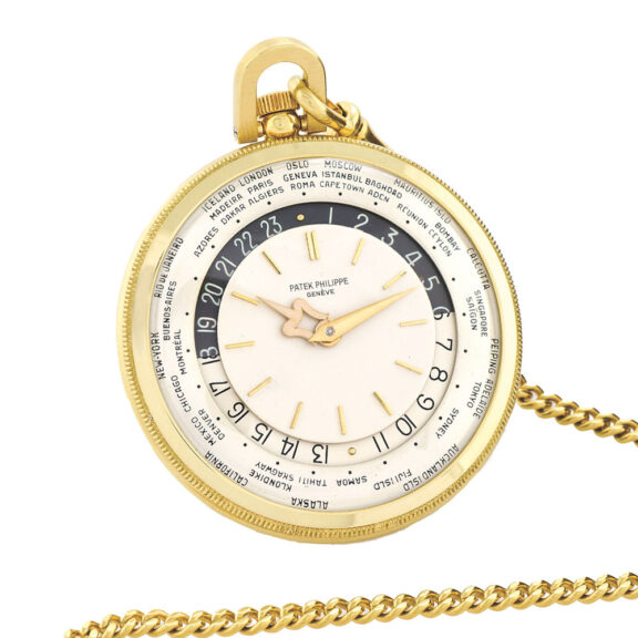 Swiss yellow gold keyless ‘World Time’ dress watch with a long gold chain Circa 1964