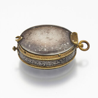 Early English gilt-metal and silver oval watch case Circa 1625