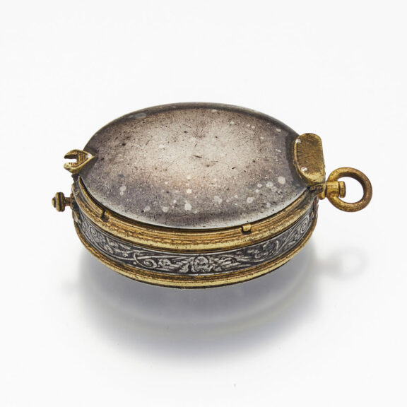 Early English gilt-metal and silver oval watch case Circa 1625 Early English gilt-metal and silver oval watch case Circa 1625