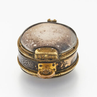 Early English gilt-metal and silver oval watch case Circa 1625