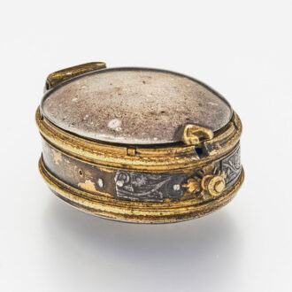 Early English gilt-metal and silver oval watch case Circa 1625