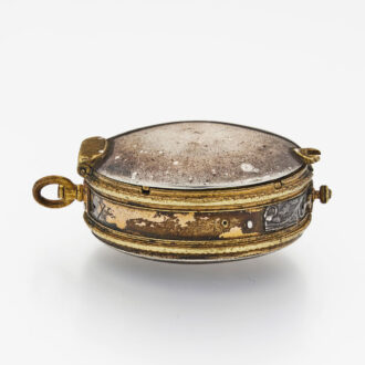 Early English gilt-metal and silver oval watch case Circa 1625