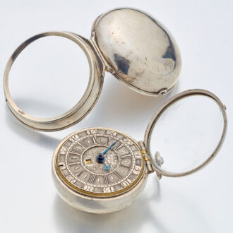 English silver watch with date and glazed balance cock Circa 1695