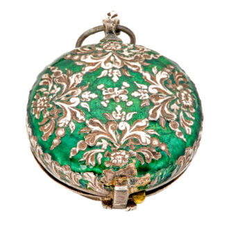 Decorative silver and enamel pill box in watch form Circa 1650