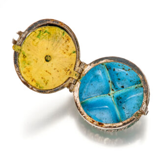 Decorative silver and enamel pill box in watch form Circa 1650