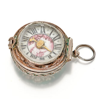 Decorative silver and enamel pill box in watch form Circa 1650